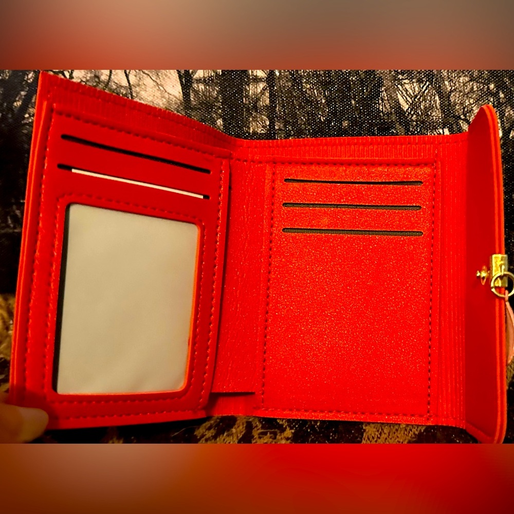 NWOT Forever Lovely red wallet with plenty of card holders and one cash area